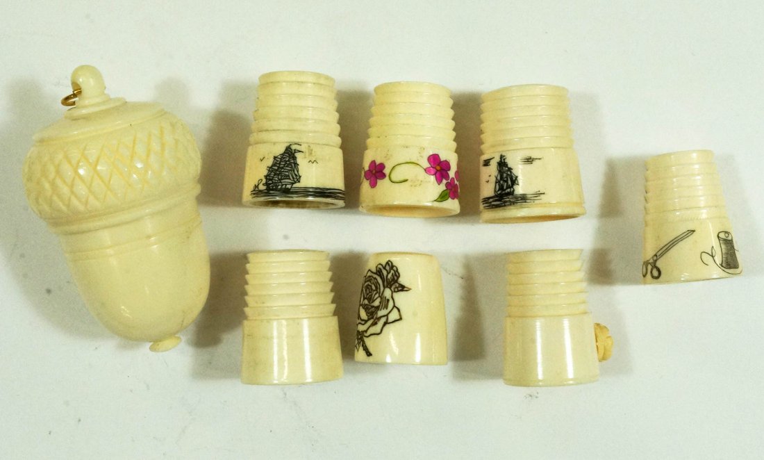 8pc Ivory Carved Thimbles & Acorn Needle Case.: 8pc Ivory Carved Thimbles & Acorn Needle Case.