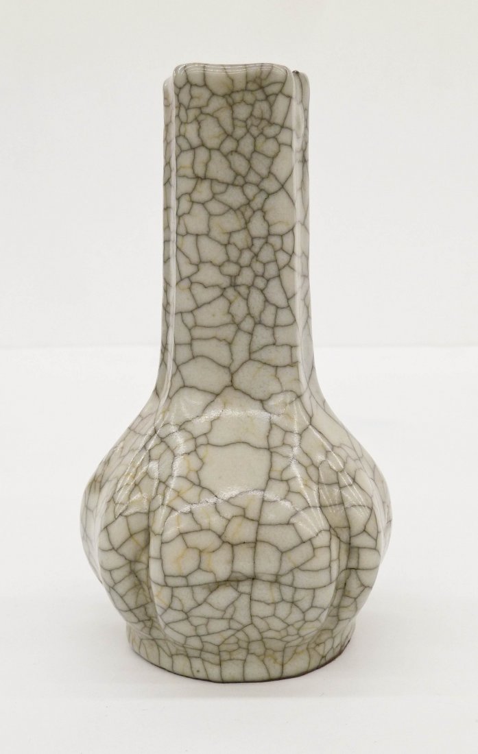 Chinese Song Ge-Yao Lobed Bottle Vase 5.5''x3''. Period: Chinese Song Ge-Yao Lobed Bottle Vase 5.5''x3''. Period vase with controlled black and brown crackle glazes. ''John Sparks 128 Mount Street W.'' collection label on bottom with ''Sung No.23'' written 