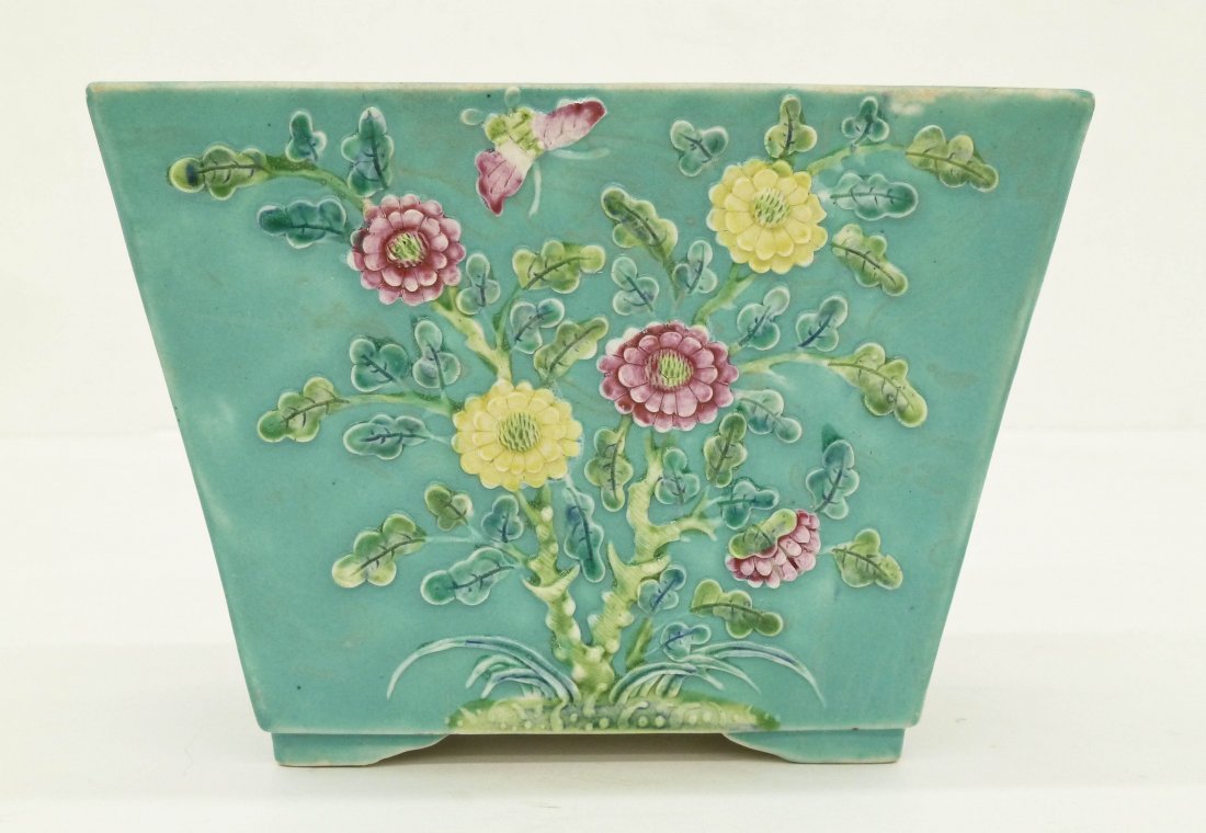 Antique Chinese Relief Molded Porcelain Planter or Bulb: Antique Chinese Relief Molded Porcelain Planter or Bulb Pot 4.5''x6.25''. Famille rose coloring with blossoming prunus, lotus, peony, and chrysanthemum flowers. Impressed commemorative Qianlong seal m