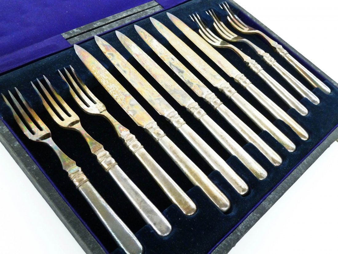 Antique Tuck Chang Chinese Export Silver Dessert Set in: Antique Tuck Chang Chinese Export Silver Dessert Set in Fitted Case. Complete set is a service for six with solid sterling silver 7'' knives and 6'' forks. Excellent condition with no monograms. Set w