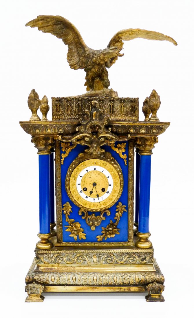 Antique French Gilt Bronze Eagle Mantel Clock: Antique French Gilt Bronze Eagle Mantel Clock 22''x11.5''. Etched ormolu eagle finial with outstretched wings. Columns and body have been repainted blue. No visible manufacturer marks. Non working ord