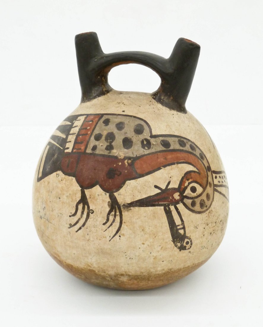 Nazca Peruvian Pre Columbian Stirrup Vessel 7.75''x6''.: Nazca Peruvian Pre Columbian Stirrup Vessel 7.75''x6''. Large form with polychrome painted bird holding fish effigy on exterior. Old professional repair to handle. Peru, 300 to 700 CE. Collection of J