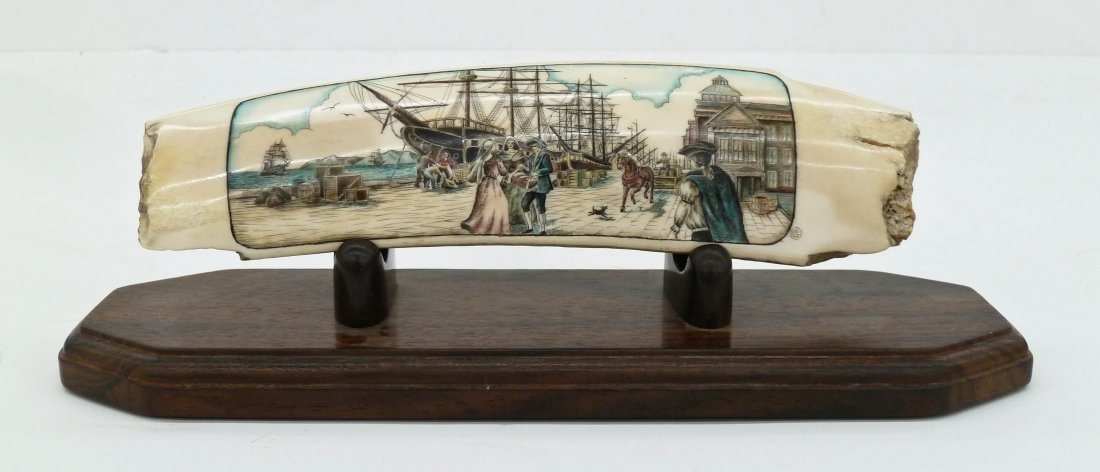 Fine Scrimshawed Ivory Sculpture on Stand 3.25''x10''.: Fine Scrimshawed Ivory Sculpture on Stand 3.25''x10''. Intricately detailed colored scenic of an English harbor scene. Maker initialed ''LG'' lower right. Tusk itself is 8.25''x2.25'' and weighs 334 g