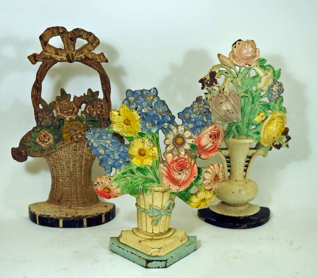Three Antique Cast Iron Doorstops Flower Baskets Size: Three Antique Cast Iron Doorstops Flower Baskets Size Range 8.5 x 11 Tall