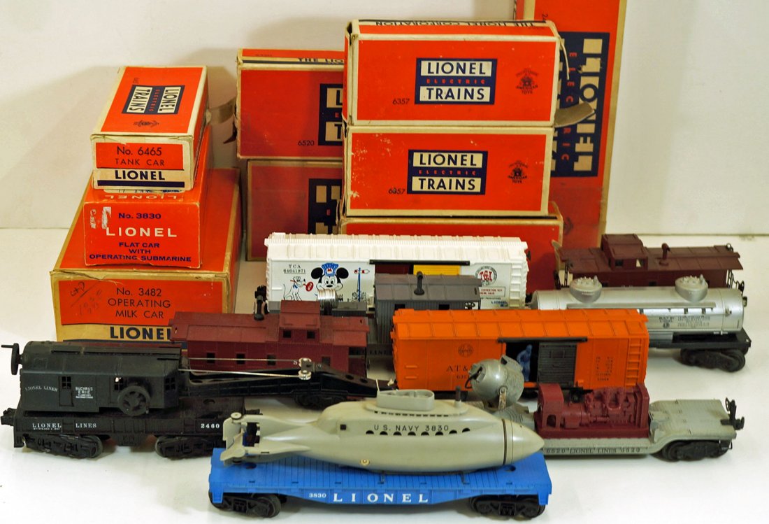 Group Vintage Lionel Toy Trains w/Original Boxes, Total: Group Vintage Lionel Toy Trains w/Original Boxes, Total of (9) pieces, includes 3830 Flat Car w/Operation Submarine (MIB), #3482 Operation Milk Car MIB, #2460 Bucyrus Erie Crane MIB, #'s 6465, 6357, 6