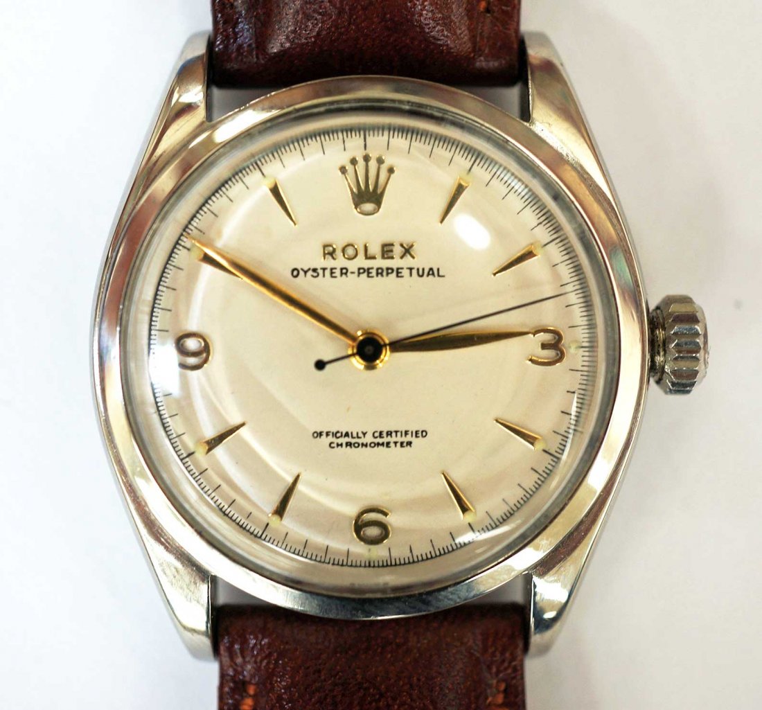 Rolex Men's SS Vintage Bubble Back Leather Strap Wrist: Rolex Men's SS Vintage, circa 1960's Bubble Back Leather Strap Wrist Watch, Dial diameter 28mm, recently serviced, working order. The crown on this watch unscrews and screws perfectly as it was recent