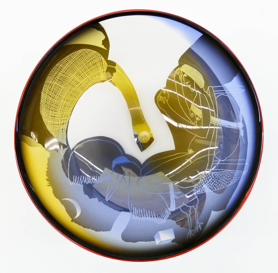 Ann Warff & Wilke Adolfsson Swedish Art Glass Bowl: Ann Warff & Wilke Adolfsson Swedish Art Glass Bowl 3.5''x8.75''. Blown and sandblasted glass bowl is decorated with a nude woman riding a bird. Multi-colored with red lip wrap. Signed by both artist o