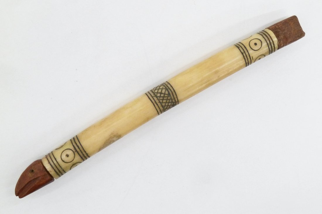 Antique Eskimo Figural Needle Case 5.5''. Fish effigy: Antique Eskimo Figural Needle Case 5.5''. Fish effigy form with carved wood painted red stoppers. Decorated bone tube body. 19th century, Inuit Yupik or Inupiaq Alaskan. Collection of artist Danny Pie