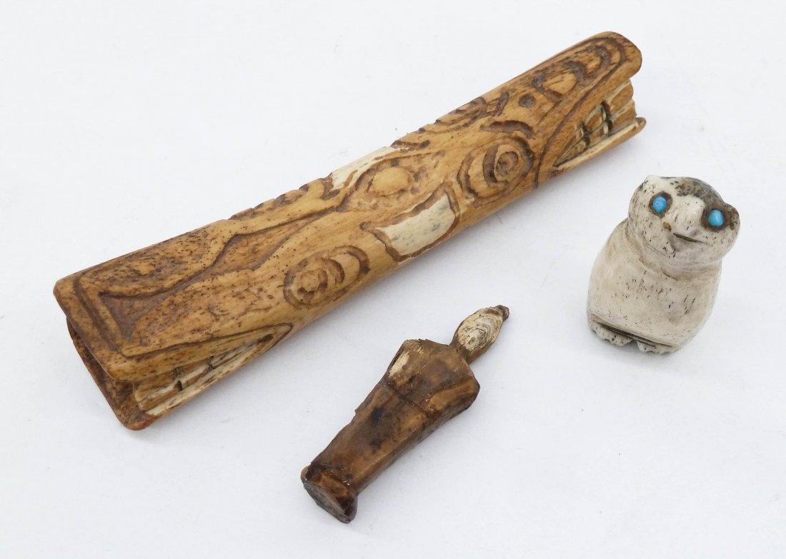 3pc Antique Eskimo Small Artifacts. Includes a carved: 3pc Antique Eskimo Small Artifacts. Includes a carved bone soul catcher 4'', an early ivory human figure 1.75'', and a whale bone owl with turquoise bead eyes 1.25''. Late 19th or early 20th century, 