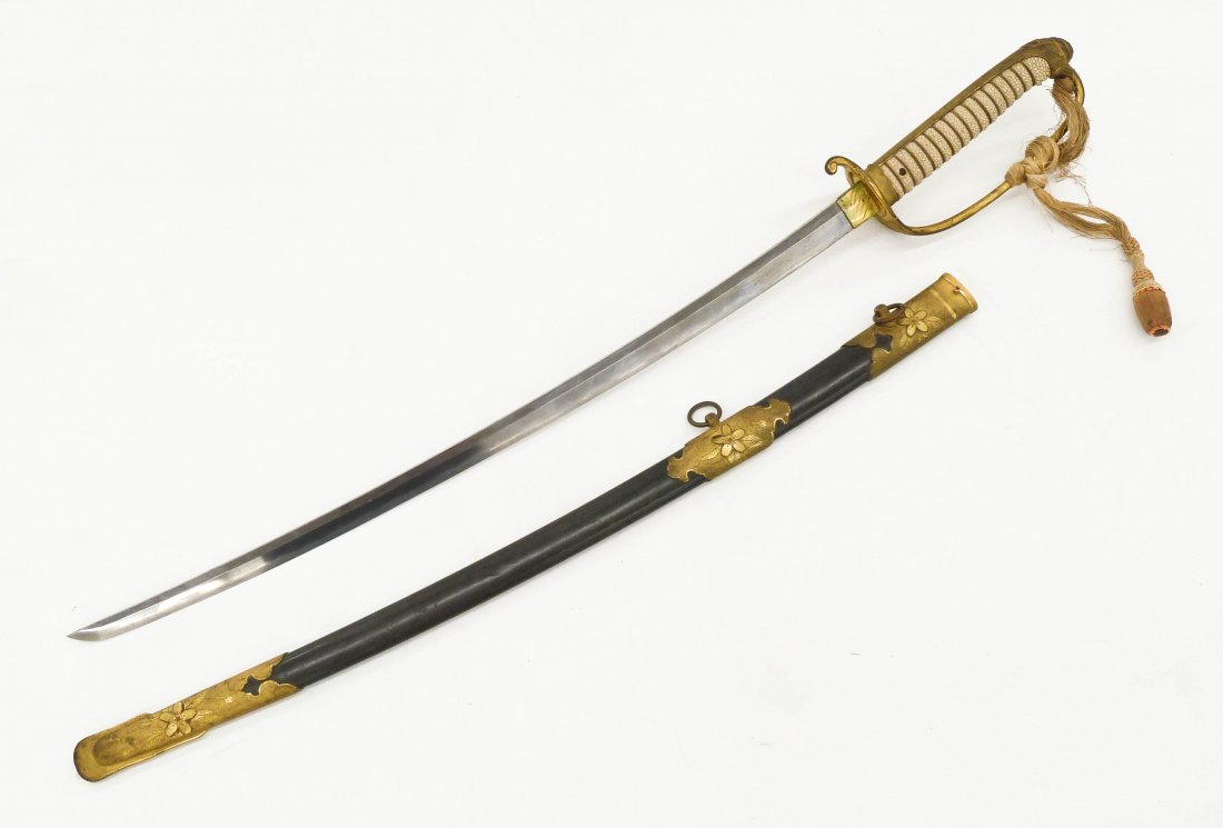 WWII Japanese Naval Officer's Sword 36.5''. Gilt handle: WWII Japanese Naval Officer's Sword 36.5''. Gilt handle and ornaments on scabbard. White shagreen handle. Overall light wear. Showa period, Japan. Search terms: samurai sword, katana.