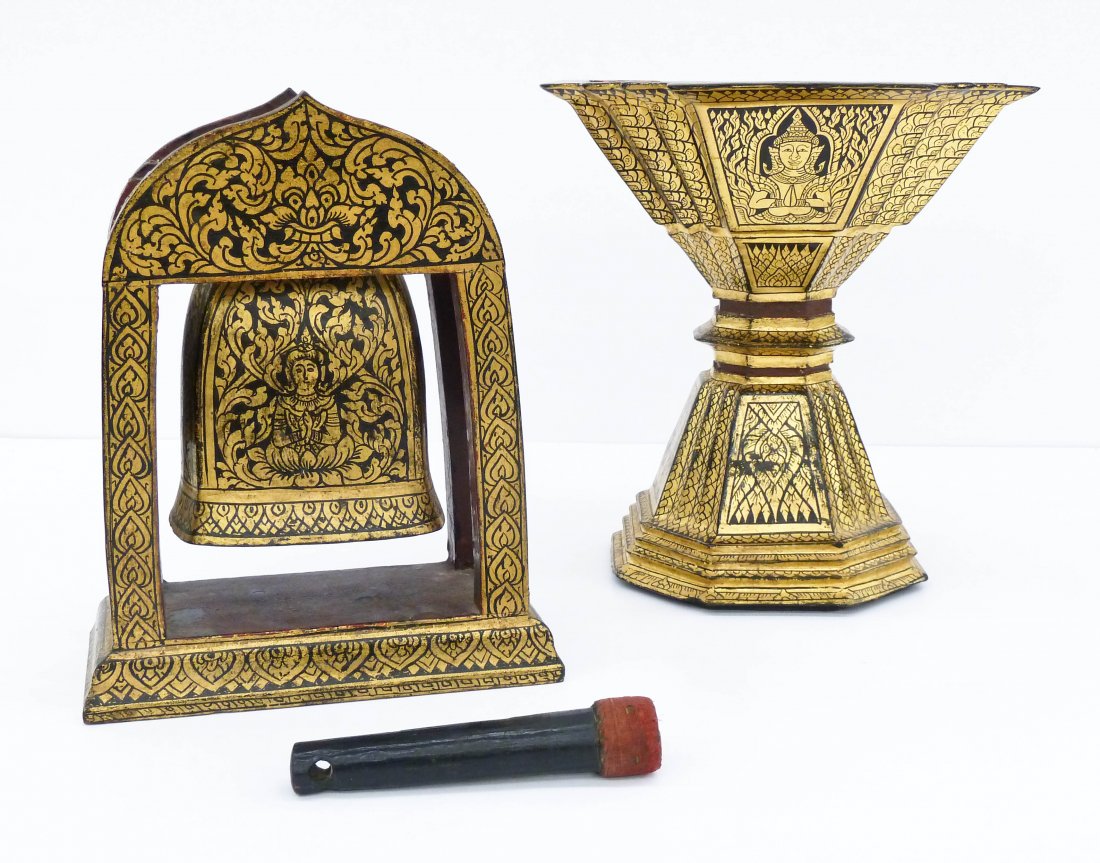 2pc Antique Thai Offering Bowl & Cong Bell. Both are: 2pc Antique Thai Offering Bowl & Cong Bell. Both are made of lacquered and gilt decorated carved wood with metal bell. Each has seated buddha imagery. Bell on stand measures 10.75''x8.5'' and pedestal