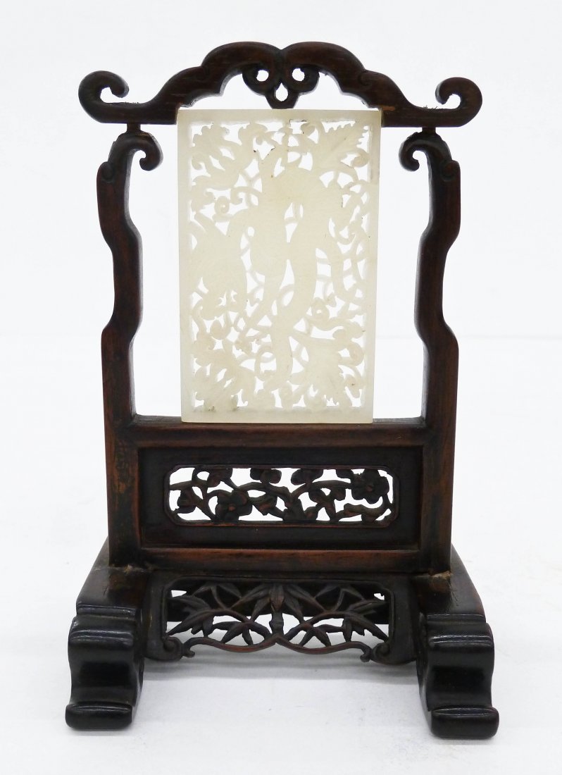 A Fine Chinese White Jade Dragon Pendant on Screen: A Fine Chinese White Jade Dragon Pendant on Screen Stand 5.5''x3.5''. Antique pierced two layer four-clawed dragon tablet measuring 1.75''x2.75'' by itself. Comes with a pierced rosewood stand table s
