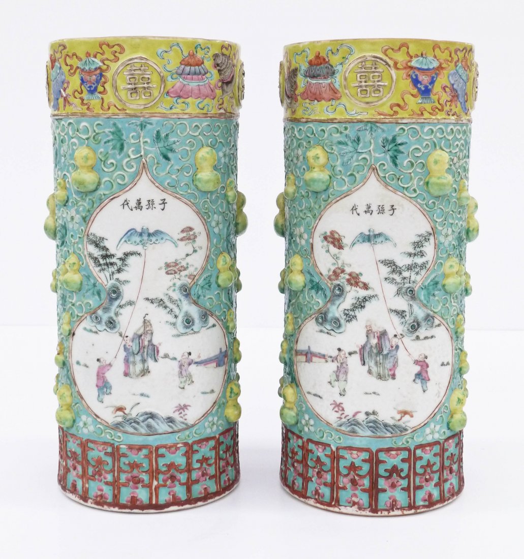 Pair of Chinese Molded Porcelain Hat Stands 11.5''x5'': Pair of Chinese Molded Porcelain Hat Stands 11.5''x5'' Each. Antique true opposing pair with famille rose polychrome enameling. Each has two double gourd shaped cartouches with scenes of scholars with