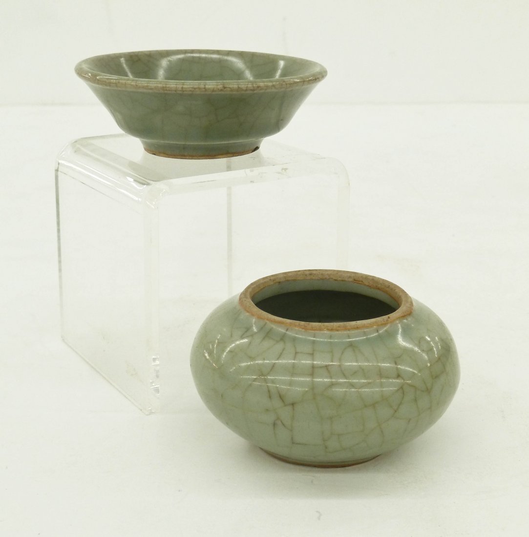 2pc Chinese Longquan Celadon Small Dishes. Includes a: 2pc Chinese Longquan Celadon Small Dishes. Includes a small jar or jarlet 1.75''x3.25'' and a small brush washer dish 1''x3.5''. Both have ge type crackle glaze. Dish has small chip to foot, otherwise