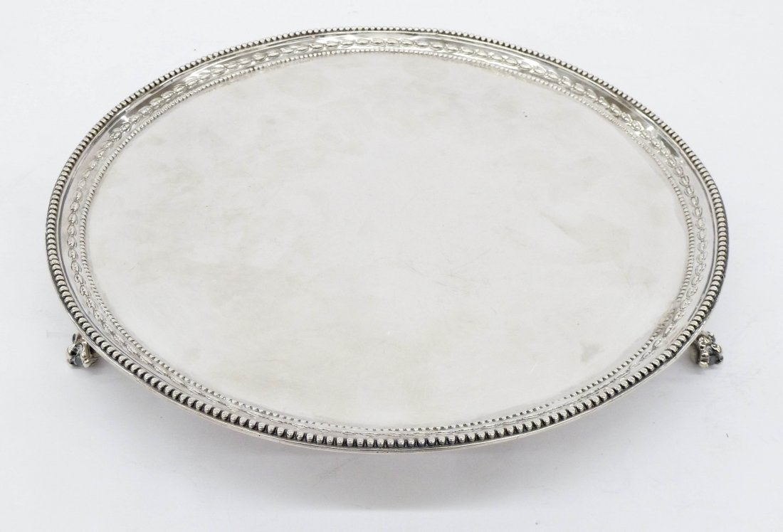 George III Silver Salver by Richard Turner & John Shea,: George III Silver Salver by Richard Turner & John Shea, London 12''x1.5''. English hallmarked sterling tray date marked 1776. Decorated leaf edges with ball and claw feet. No monograms with clear hall