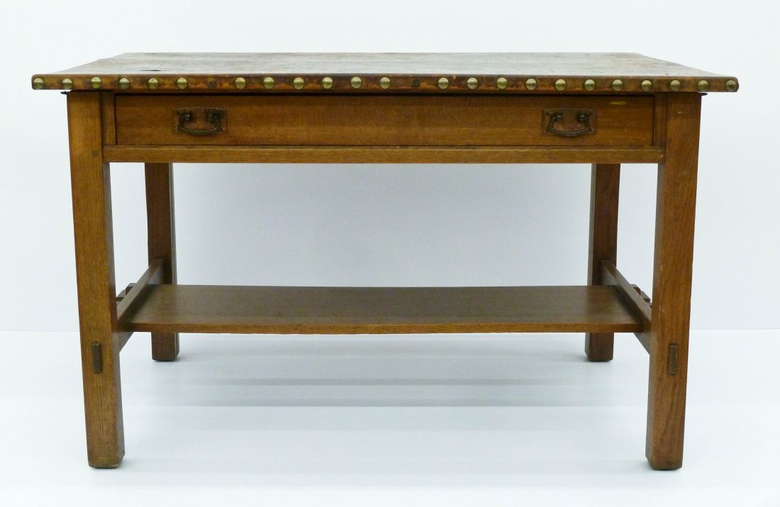 L&JG Stickley Oak Library Table 29''x48''x30''. Form: L&JG Stickley Oak Library Table 29''x48''x30''. Form number 531 library table or desk. Brown leather wrapped top with large upholstery buttons on edge. Marked with red L&JG label on interior of leg. O