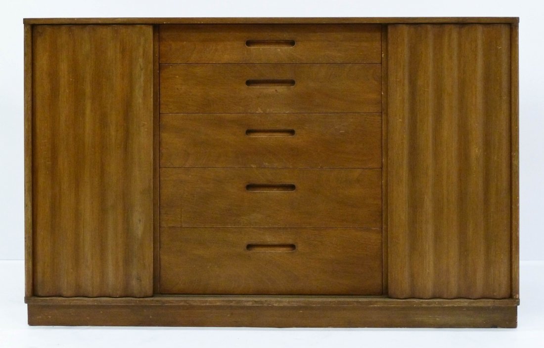 Edward Wormley for Dunbar Mahogany Credenza: Edward Wormley for Dunbar Mahogany Credenza 31.5''x49''x20''. It has five central drawers flanked by two sliding doors. Scattered wear from use. Mid century modern furniture could be used as a bookshe
