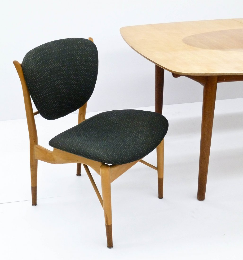 Finn Juhl for Baker Mid Century Dining Set. Includes: Finn Juhl for Baker Mid Century Dining Set. Includes four model 402 1/2 straight dining chairs measuring 32''x22''x22'' each and a model 560 two-tone top dining table 29.25''x68''x47''. The table come