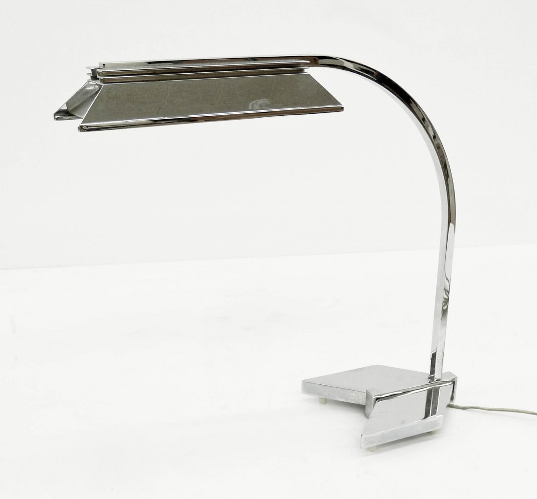 Casella Chrome Arrow Desk Lamp 17''x19''. Designer desk: Casella Chrome Arrow Desk Lamp 17''x19''. Designer desk or table lamp with gold foil label on bottom. Overall excellent condition. Mid century modern.