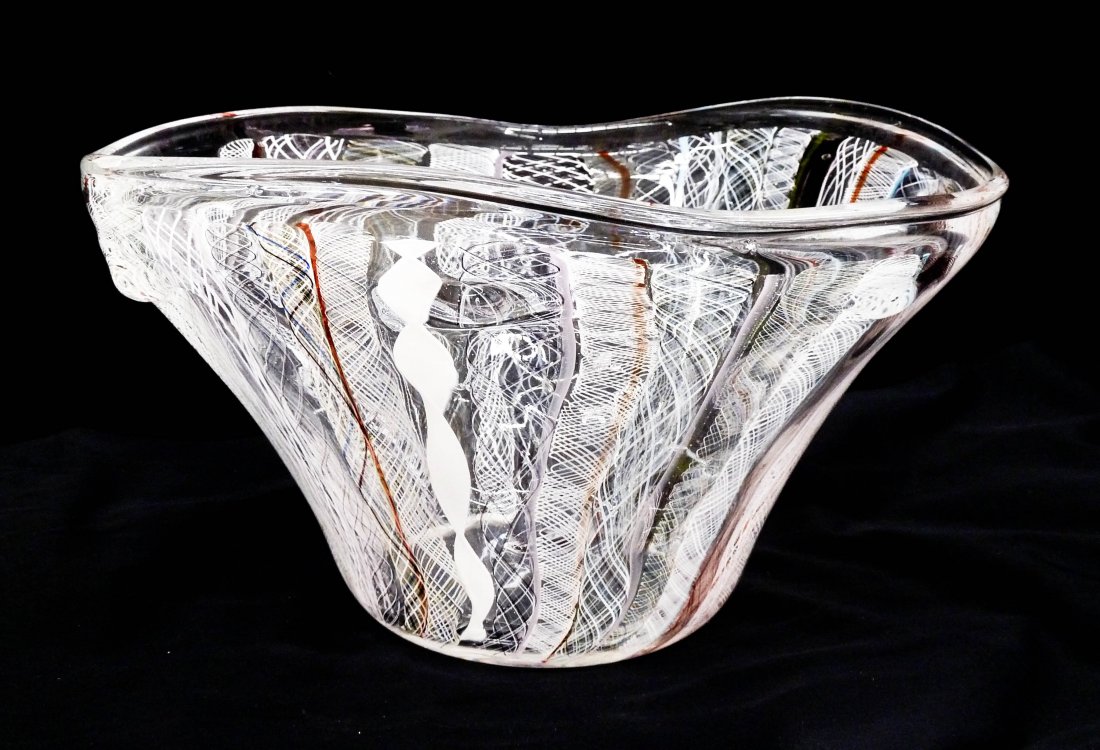 Fritz Dreisbach (b.1941 American) Mongo Bowl 1985: Fritz Dreisbach (b.1941 American) Mongo Bowl 1985 Latticino Glass 8''x13''. Multi-colored latticino glass vessel of organic form. Signed and dated on side. Excellent condition. Search terms: Pilchuck,