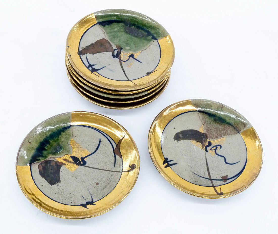 Robert Sperry (1927-1998 Washington) Set of Six: Robert Sperry (1927-1998 Washington) Set of Six Stoneware Plates 9'' Diameter Each. Gold luster glazed edges with central square. Green edge drips with brown and cobalt splashes. Most are signed on ve