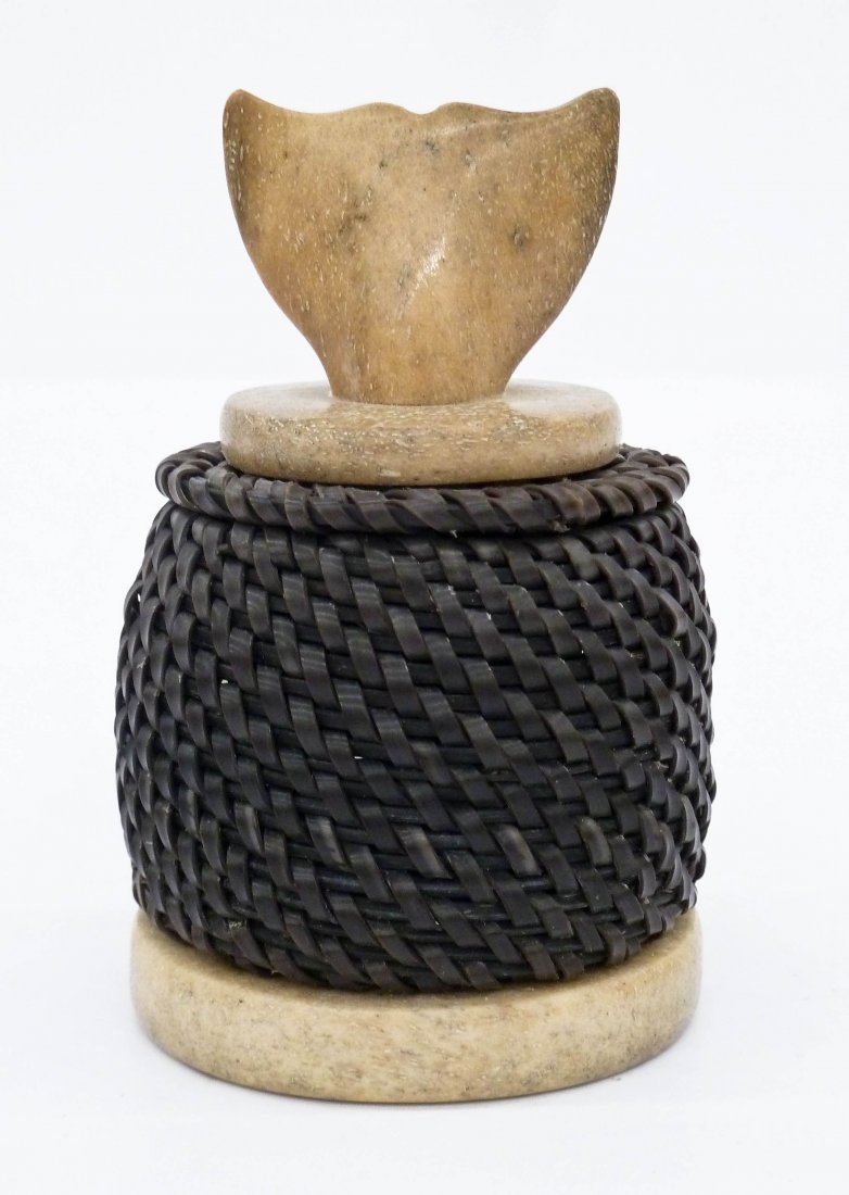 John Omnik (1930-1997 Alaskan) Baleen Basket with Whale: John Omnik (1930-1997 Alaskan) Baleen Basket with Whale Fin Finial 4.25''x2.75''. Native eskimo made treasure basket with carved whale bone finial and base. Signed ''John Omnik Point Hope Alaska 1990'