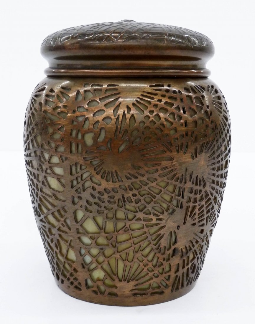 Tiffany Studios ''Pine Needle'' Humidor 6.5''x5.25''.: Tiffany Studios ''Pine Needle'' Humidor 6.5''x5.25''. Bronze with caramel slag glass. Form 1026. Missing inner lid. Overall excellent condition with original patina.