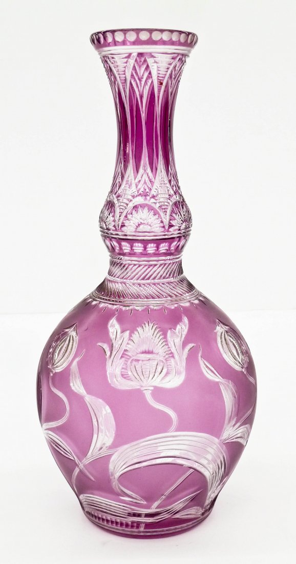 Stevens & Williams Art Nouveau Intaglio Cut Vase: Stevens & Williams Art Nouveau Intaglio Cut Vase 11.75''x5.75''. A beautiful amethyst cut to clear bottle form vase with art nouveau poppy flower repeating motifs. Unmarked, English glass. Excellent c