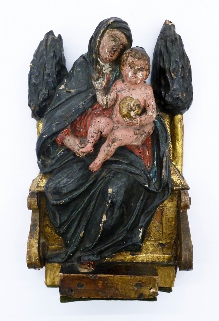 Early Italian Madonna & Child Polychrome Wood Plaque: Early Italian Madonna & Child Polychrome Wood Plaque 11''x6.5''x2''. Gilt and polychrome relief carved plaque of seated madonna with the Christ child holding a globe. They sit on a throne flanked by t