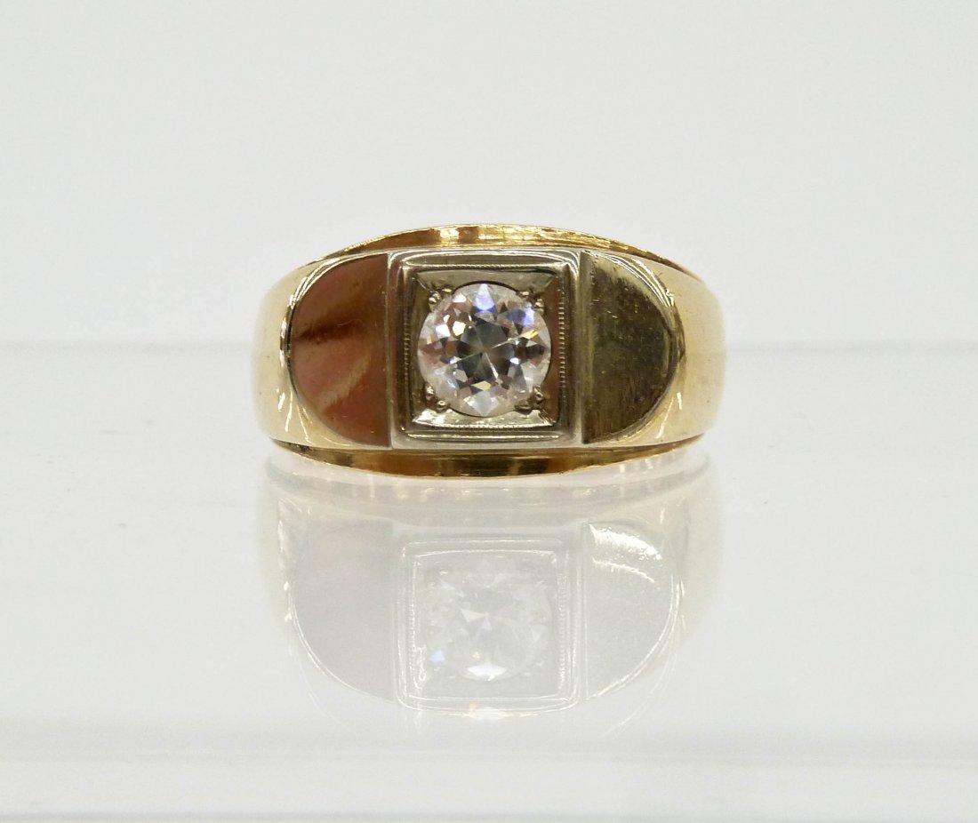 Vintage Men's Diamond Solitaire 14k Ring. It has one: Vintage Men's Diamond Solitaire 14k Ring. It has one old european cut diamond of .69 carats, clarity I-1 color F. Ring weighs 9.8 grams and is a size 9.5''. Overall excellent condition. Current apprai