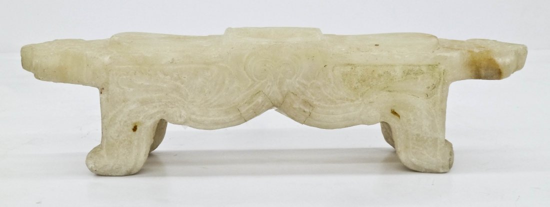 Antique Persian Carved Stone Footstool: Antique Persian Carved Stone Footstool 4.25''x16.25''x3.5''. A heavy carved stone stool from a women's bath near Isfahan, Iran. Made for placing your heels to massage and wash your feet. Relief carved