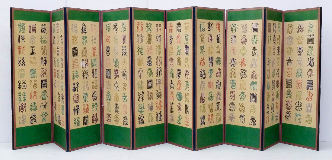 Antique Chinese Ten Panel Silk Embroidered Calligraphy: Antique Chinese Ten Panel Silk Embroidered Calligraphy Screen 53''x160''. Unusual polychrome silk embroidery of Chinese symbols and archaic calligraphy. Each panel has green silk brocade borders. Two 