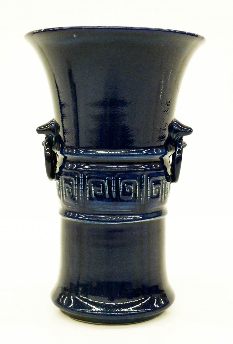 Antique Chinese Cobalt Blue Monochrome Porcelain Hu: Antique Chinese Cobalt Blue Monochrome Porcelain Hu Form Vase 11.5''x7.5''. Hu beaker form with molded mouth and ring handles. A deep consistent cobalt blue monochrome glaze covers the entire form. Re