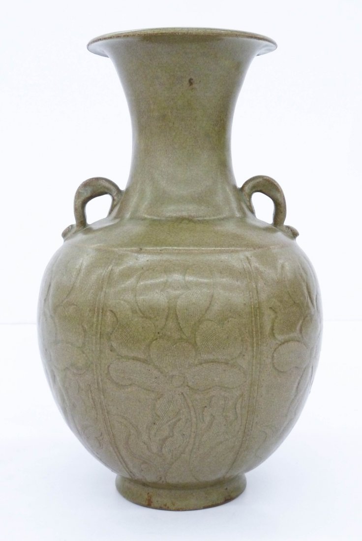 Old Chinese Longquan Celadon Handled Vase 11.5''x7''.: Old Chinese Longquan Celadon Handled Vase 11.5''x7''. Decorated with six carved panels of blossoming lotus flowers. Crackled celadon glaze. Ming style vase. Excellent condition. 19th or 20th century.