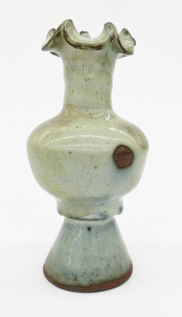 A Chinese Junyao Bottle Vase with Foliate Rim: A Chinese Junyao Bottle Vase with Foliate Rim 5.75''x3''. A jun ware vase with floral mouth. The bottom has ''S. Marchant & Son, London'' retailer and ''T.C.M. O'Donovan Collection'' labels. Copy of t