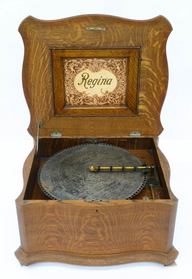 Antique Regina Oak Disc Music Box 12''x22''x20''. It