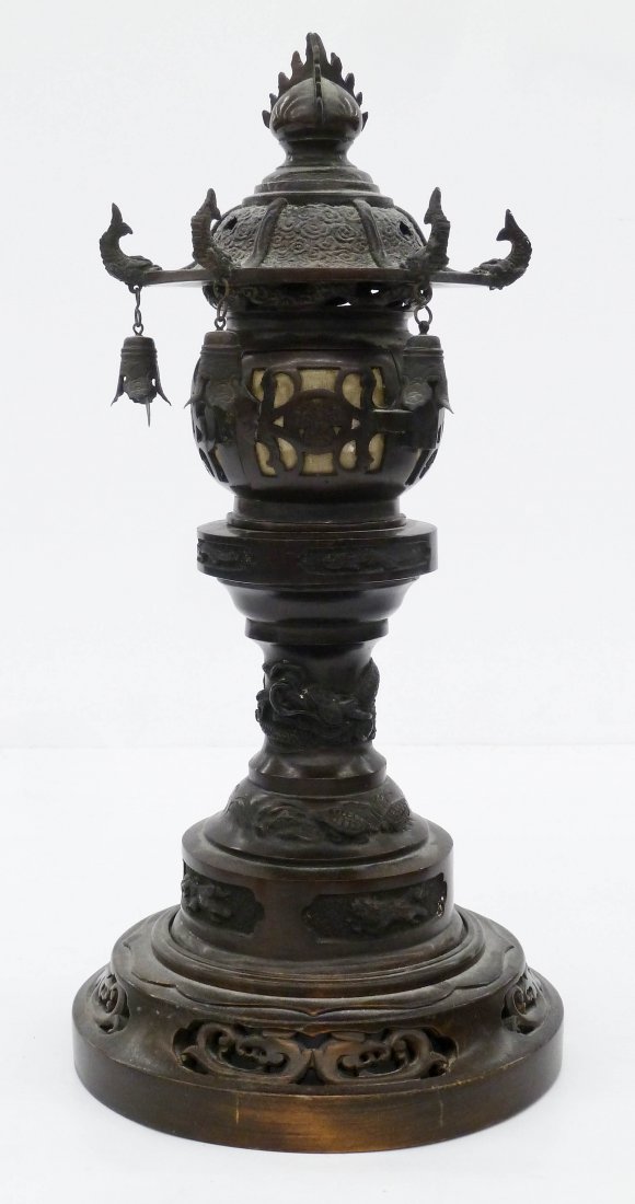 Antique Japanese Cast Bronze Lantern 14''x7''. Three: Antique Japanese Cast Bronze Lantern 14''x7''. Three stacking parts with cast dolphins and Matsudaira crest on central globe. Missing three bells. Overall excellent condition. Early 20th century, Meij