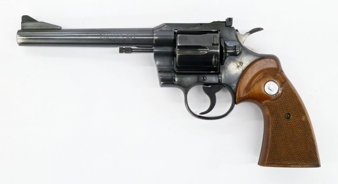 Colt Trooper .357 Magnum Revolver 11.5''. Wood grips: Colt Trooper .357 Magnum Revolver 11.5''. Wood grips with 6'' barrel. Serial number 71851. Overall excellent condition. Lot requires FFL or background check made by Pintos Guns of Renton, Washington.