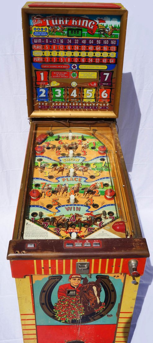 1950 Bally ''Turf King'' Coin-Operated Pinball Arcade: 1950 Bally ''Turf King'' Coin-Operated Pinball Arcade Machine 49''x74''x28.5''. Horse racing machine comes with original instruction manual. Model 523, Serial number A2900. Working condition.