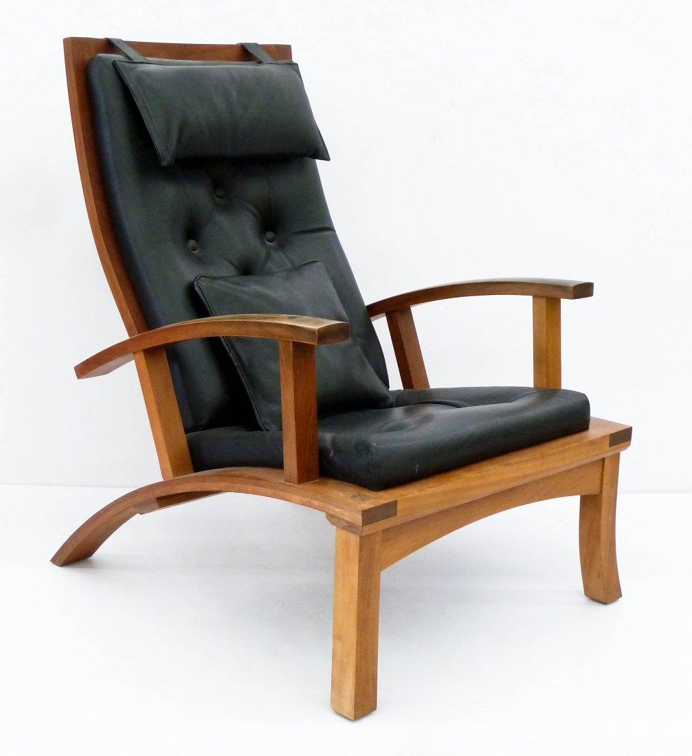 Thomas Moser ''Lolling'' 2000 Lounge Chair: Thomas Moser ''Lolling'' 2000 Lounge Chair 40''x29''x36''. Solid cherry armchair with black leather seat. Five position reclining back. Signed and dated in ink on bottom. Light overall wear. Hand made