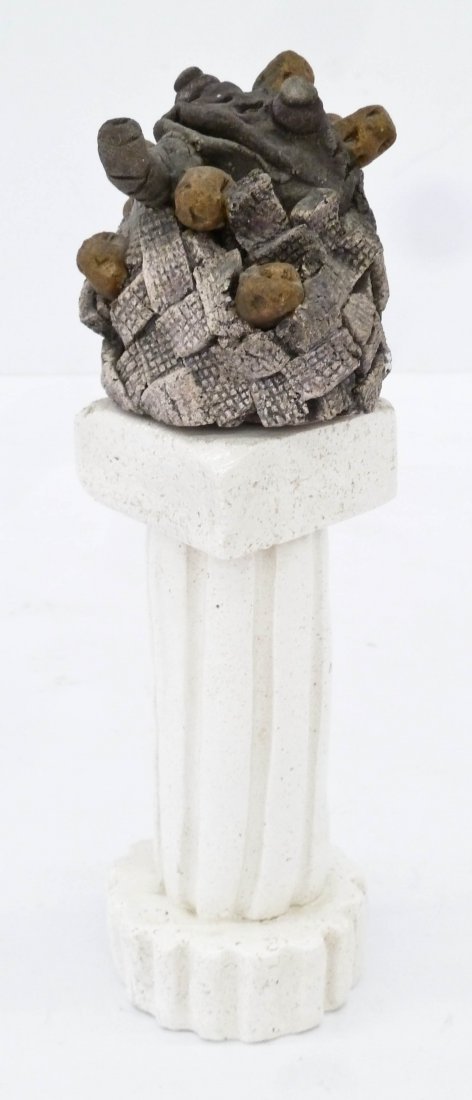 David Gilhooly (1943-2013 California) Osiris with: David Gilhooly (1943-2013 California) Osiris with Potato Head 1973 Ceramic 12.5''x4.5''. An early funk pottery frog sculpture. Signed and dated on bottom of pedestal. Small edge chip to pedestal, othe