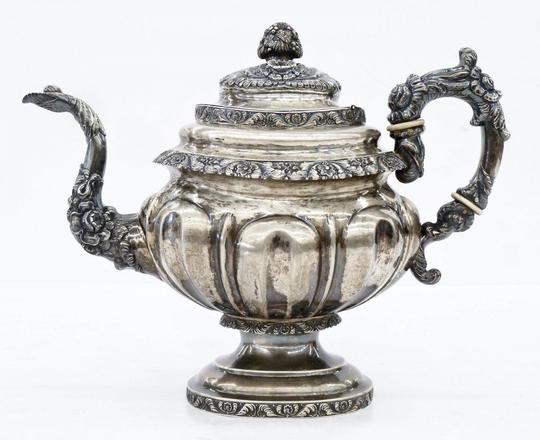 Antique Baldwin Gardiner American Silver Teapot: Antique Baldwin Gardiner American Silver Teapot 10''x13''. Highly decorated over-sized teapot with repousse floral and hand motifs. An early 19th century teapot signed ''B. GARDINER'' on bottom. It we