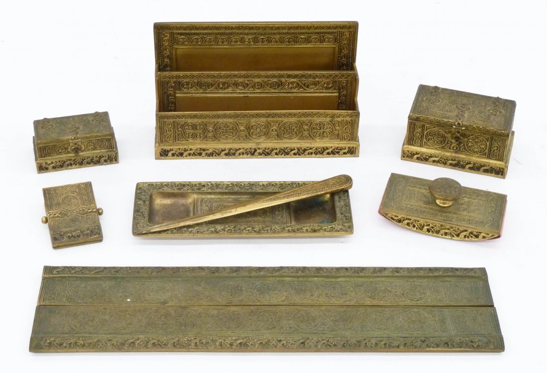 Tiffany Studios ''Venetian'' Bronze Desk Set. Eight pie: Tiffany Studios ''Venetian'' Bronze Desk Set. Eight piece gilt bronze desk set includes a letter holder 6''x10'', a double inkwell 3''x5.5'', a stamp box 2''x4'', a blotter 5.5'', a paper clip 3.5'', 