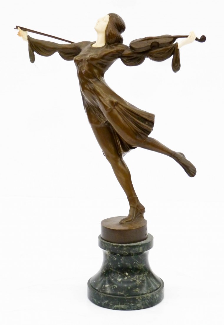 J. Ulrich (20th Cent. Austrian) Dancing Violin Player: J. Ulrich (20th Cent. Austrian) Dancing Violin Player Bronze Sculpture 16''x11.5''. A beautiful art deco bronze dancer with carved ivory features. Signed ''J. ULRICH Made in Austria'' near base. Repai