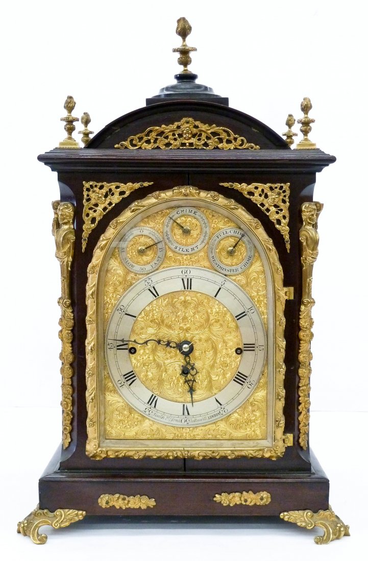 Impressive English Triple Fusee Bracket Clock by Smith: Impressive English Triple Fusee Bracket Clock by Smith & Sons, London 25''x16''x11''. Mahogany case with gilt bronze ormolu mounts. Eight bell chime and in working order. Overall excellent condition. 