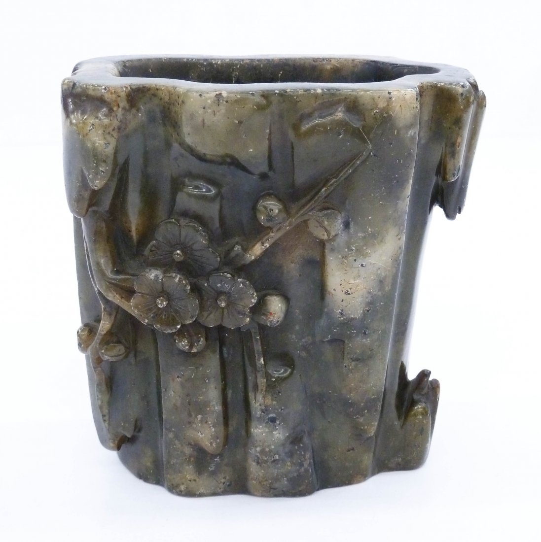 Antique Chinese Soapstone Brush Pot 5''x5''. An unusual: Antique Chinese Soapstone Brush Pot 5''x5''. An unusual naturalistic form with carved blossoming prunus flower branch motif. Overall excellent condition with light edge wear. 18th or 19th century, Qin
