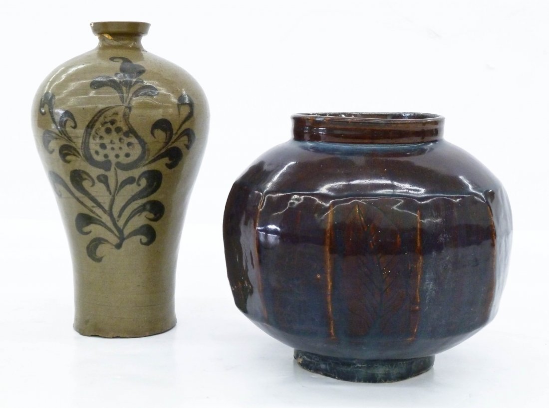 2pc Antique Korean Ceramics. Includes a Maebyeong: 2pc Antique Korean Ceramics. Includes a Maebyeong decorated celadon vase 10.25''x6''. Also a brown glazed cut sided jar with leaf and fish motifs 7.5''x8''. Vase has a repaired spout, otherwise excell