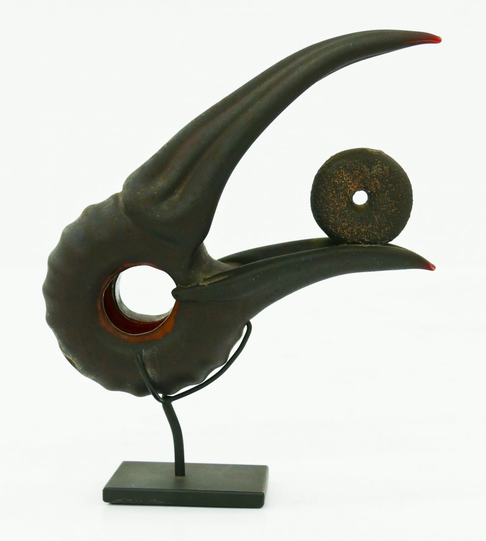 William Morris (b.1957 Washington) Toucan with Disc: William Morris (b.1957 Washington) Toucan with Disc Finial 1998 Glass Artifact 5.75''x5''. Hand blown and sculpted glass bird artifact. Signed and dated on back pontil. Without stand it measures 4.5''