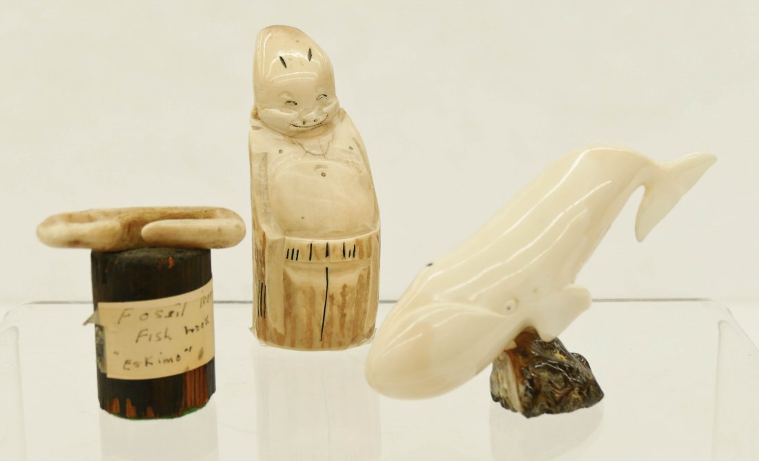 3pc Vintage Alaskan Eskimo Ivory Artifacts. Includes a: 3pc Vintage Alaskan Eskimo Ivory Artifacts. Includes a carved Billiken 3.75'', a whale sculpture 2.5''x4.5'' unsigned, and a fossilized ivory fish hook implement 2.25''. Overall excellent condition.