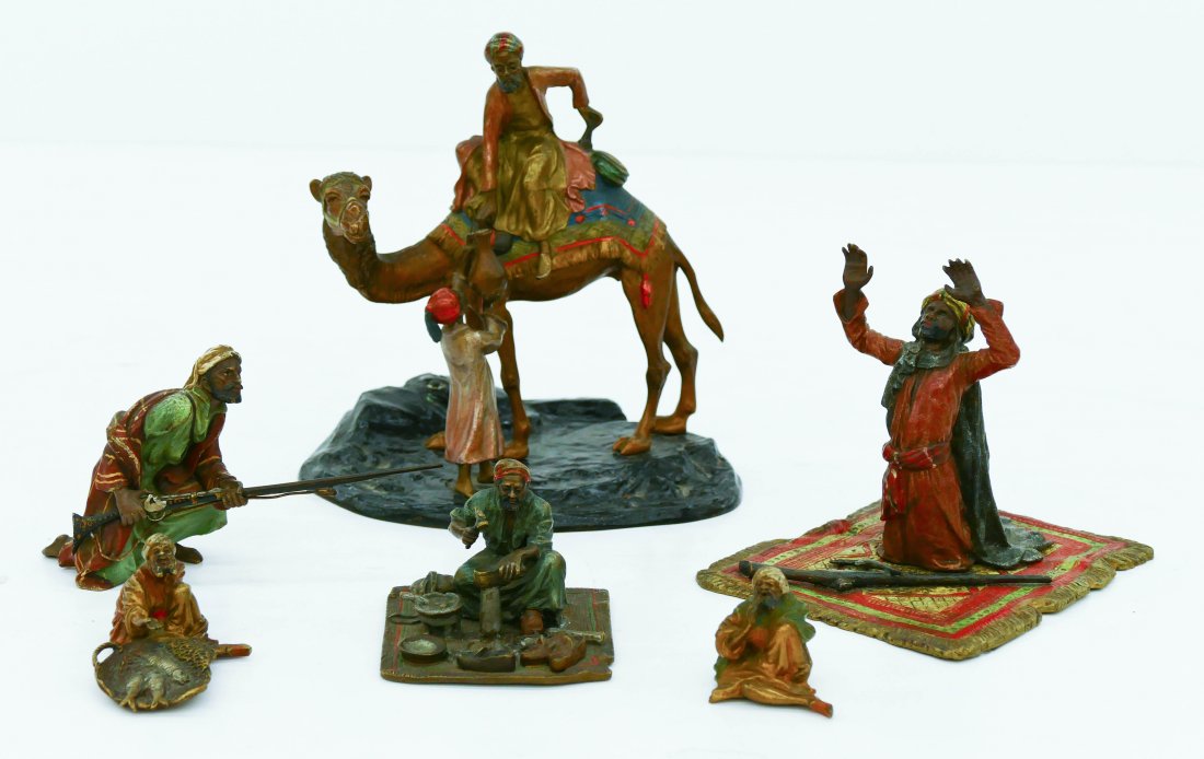 Franz Bergman (1898-1963 Austrian) Six Orientalist Cold: Franz Bergman (1898-1963 Austrian) Six Orientalist Cold Painted Bronzes. Includes an arab on carpet 4''x5'', a kneeling man holding a rifle 3''x5'' (signed), an altered lamp base with camel 6''x6'', a